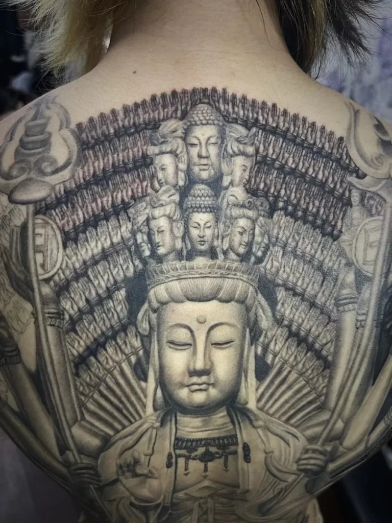 Black-and-grey thousand-arm Guanyin full back tattoo by Yuyi