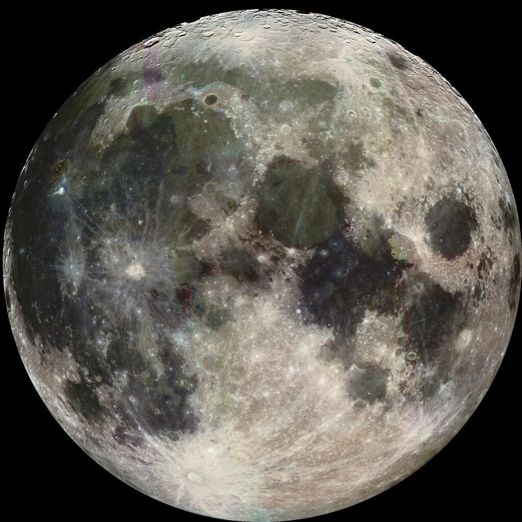 Full moon with visible craters and dark surface areas against a black sky